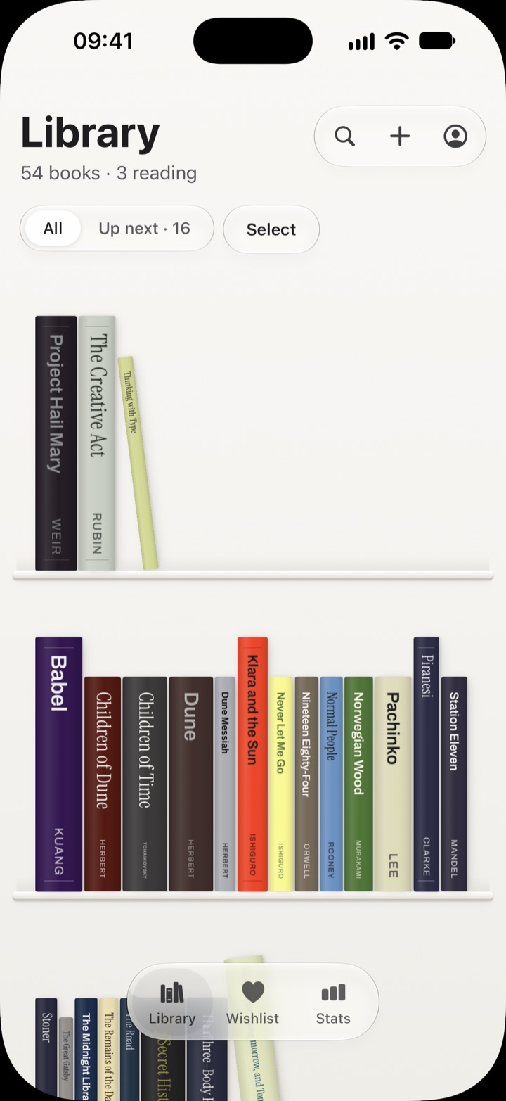 The Library: books standing as spines on white shelves